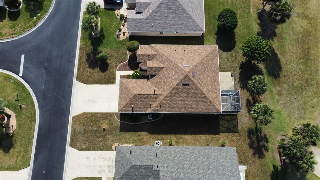 15598 Southwest 11th Terrace Road Ocala, FL 34473 - Photo 4 of 27 an aerial view of a house with a swimming pool