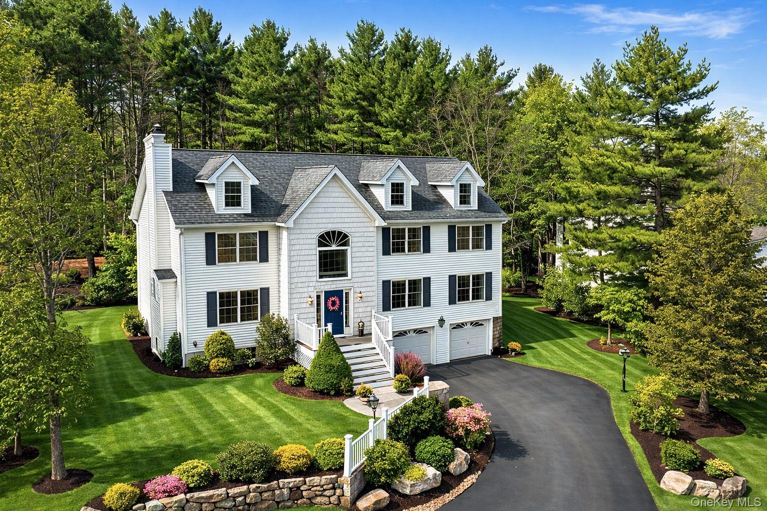 9 Mt Ridge Court Monroe, NY 10950 - Photo 1 of 49 a front view of a house with a yard