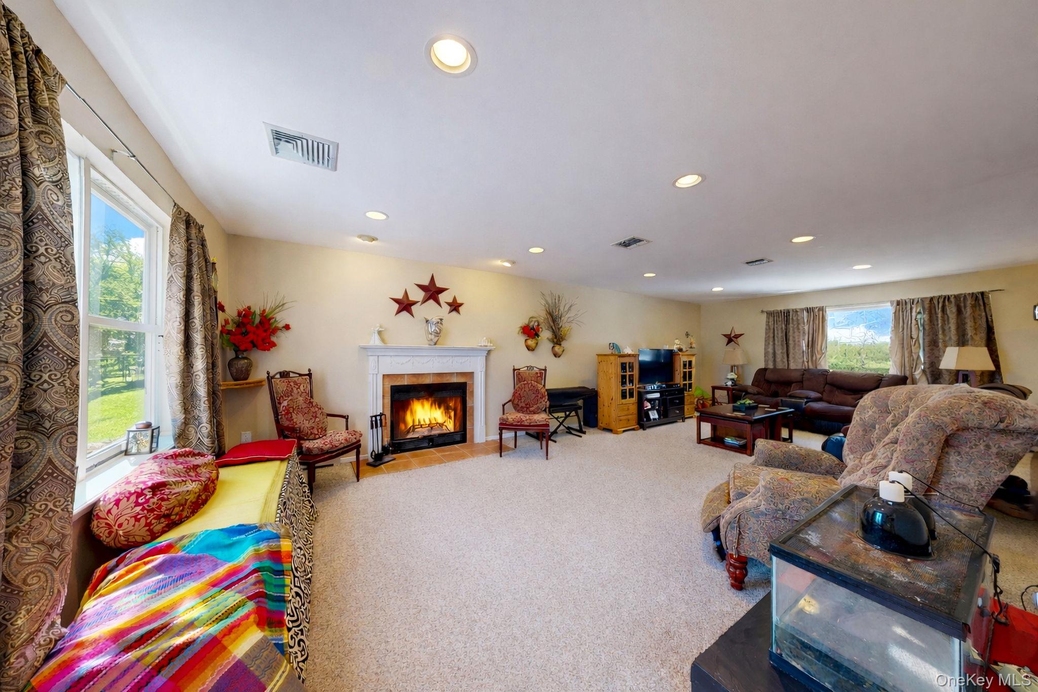 9 Mt Ridge Court Monroe, NY 10950 - Photo 14 of 49 a living room with furniture and a fireplace