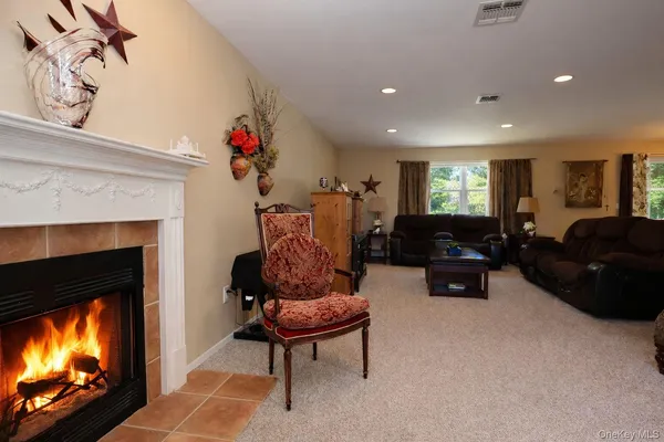 a view of a dining room with furniture and window