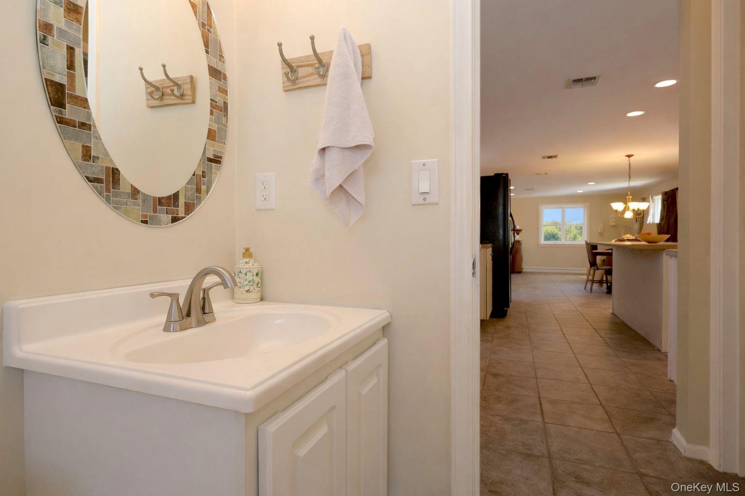 9 Mt Ridge Court Monroe, NY 10950 - Photo 21 of 49 a bathroom with a sink and a mirror