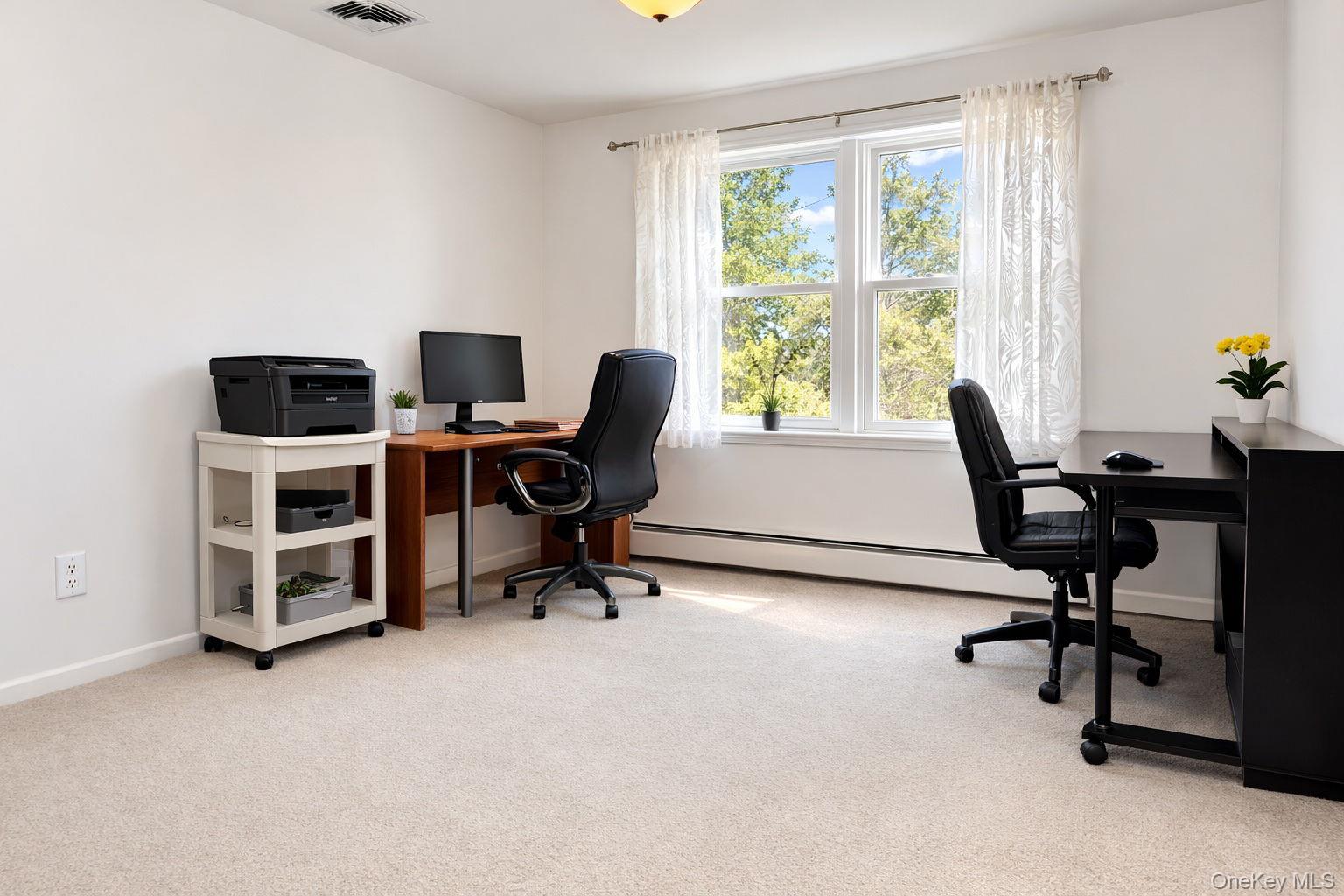 9 Mt Ridge Court Monroe, NY 10950 - Photo 24 of 49 a view of a workspace with furniture and a window