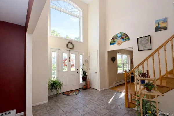 a view of an entryway with a flower garden