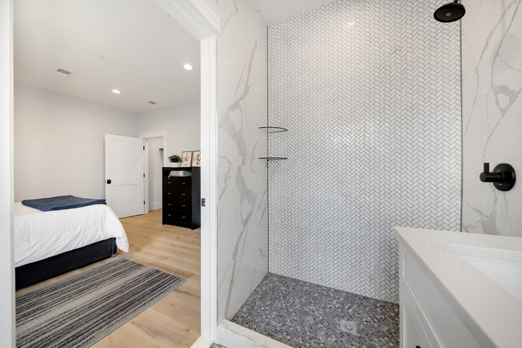 66 Fawndale Road, Unit 3 Boston, MA 02131 - Photo 15 of 15 a bathroom with a sink and a shower