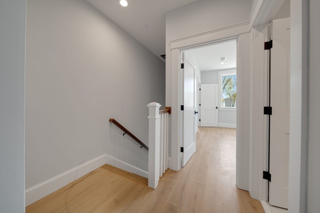 66 Fawndale Road, Unit 3 Boston, MA 02131 - Photo 8 of 15 wooden floor with a bathroom