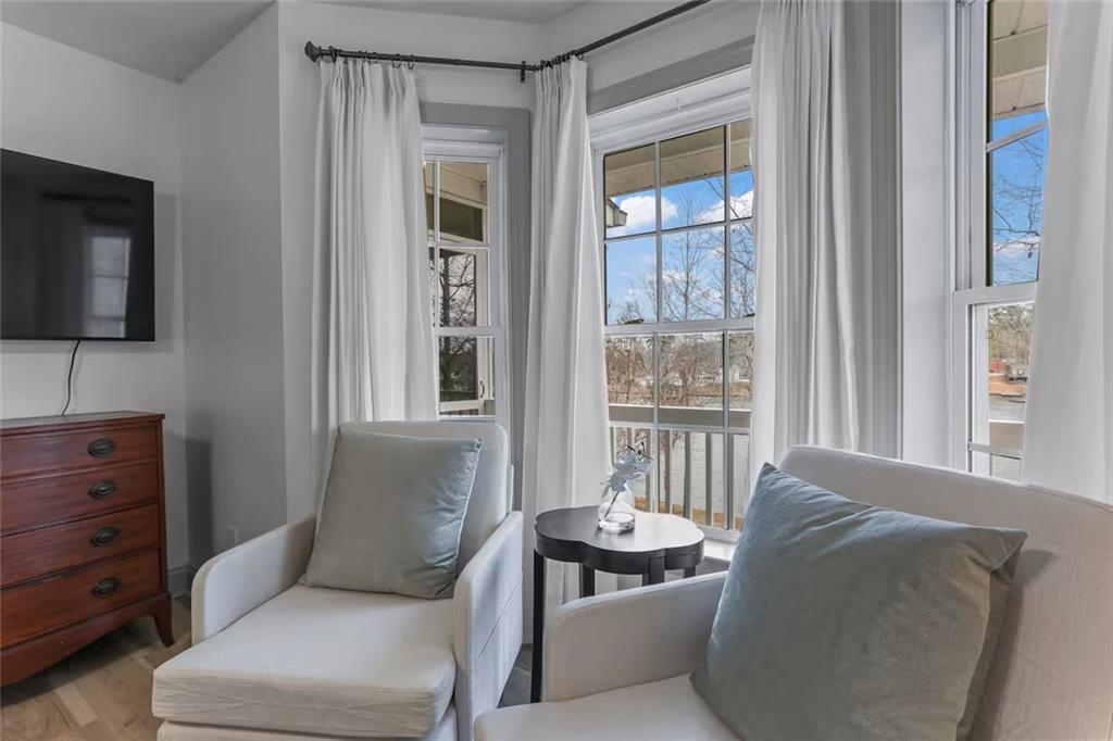 44 Sheffield Court Sparta, GA 31087 - Photo 13 of 24 a living room with furniture and a flat screen tv