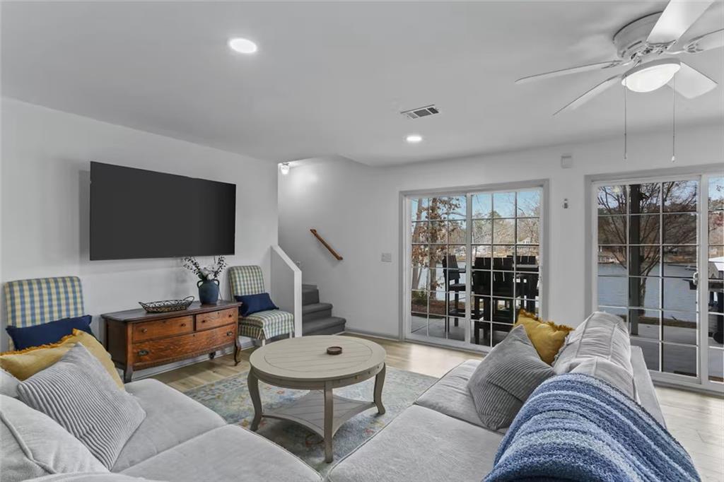 44 Sheffield Court Sparta, GA 31087 - Photo 20 of 24 a living room with furniture and a flat screen tv