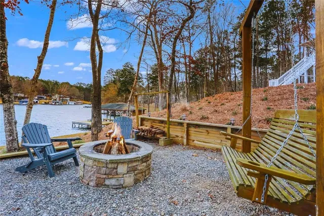 a view of a chairs and table in the patio