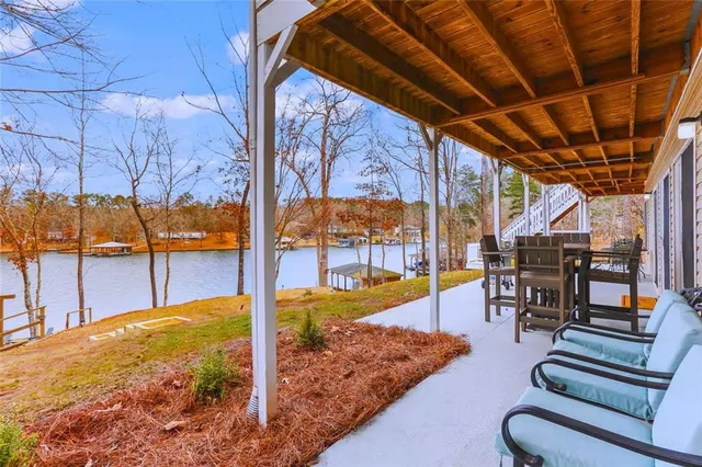 a view of a swimming pool with a patio