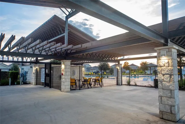 a view of a porch with furniture
