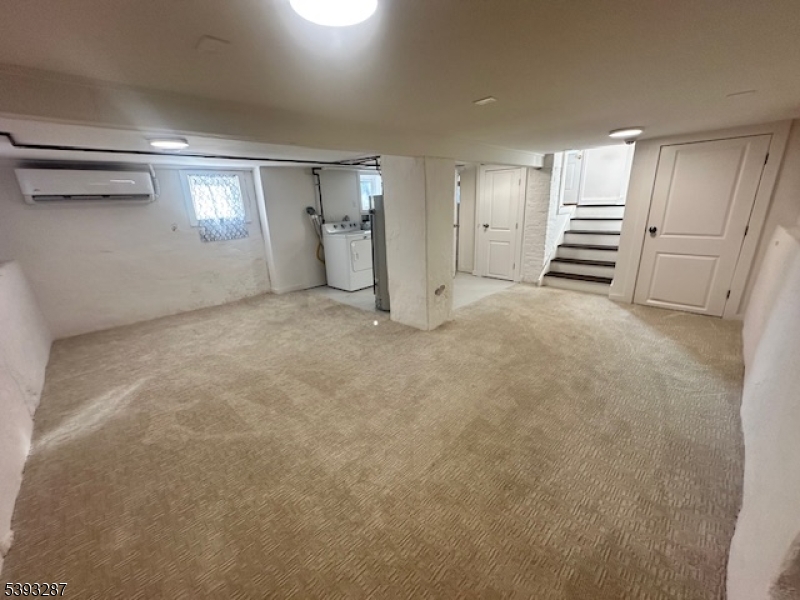 56 Buena Vista Road, Unit 1 Cedar Grove, NJ 07009 - Photo 12 of 16 a view of an empty room with a window