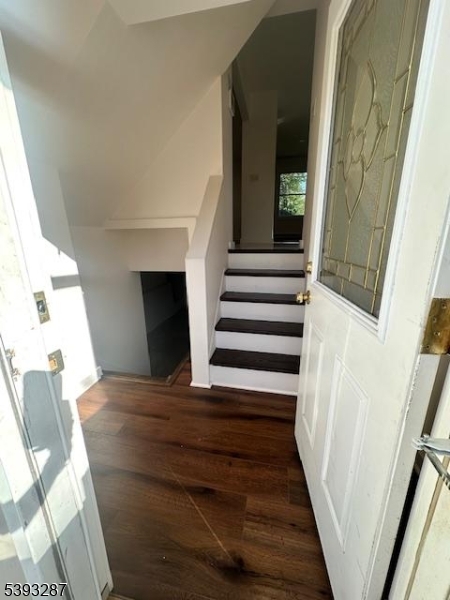 56 Buena Vista Road, Unit 1 Cedar Grove, NJ 07009 - Photo 15 of 16 a view of entryway and hall with wooden floor