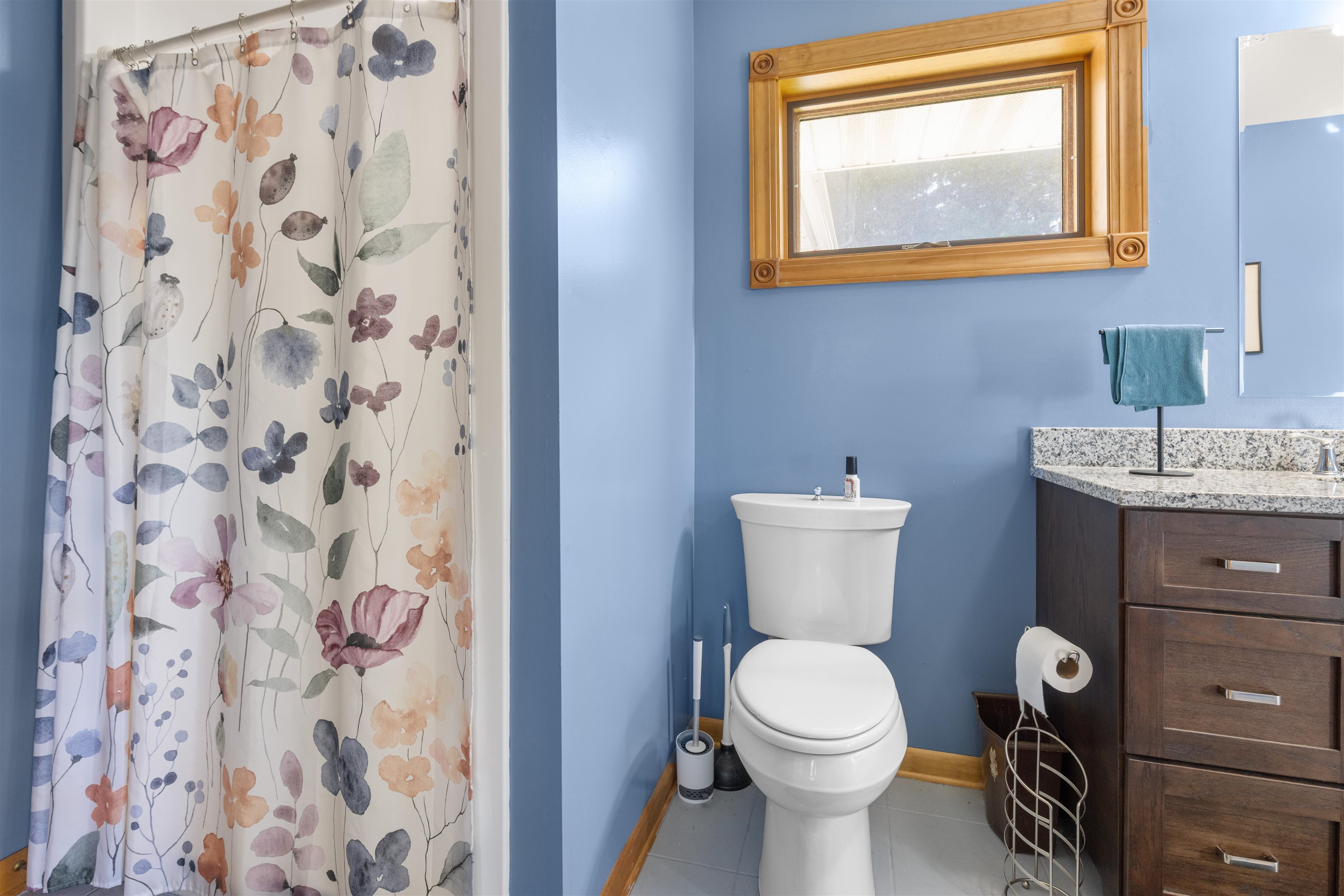 1610 South Turtle Town Hall Road Beloit, WI 53511 - Photo 12 of 50 a bathroom with a toilet a sink and a mirror