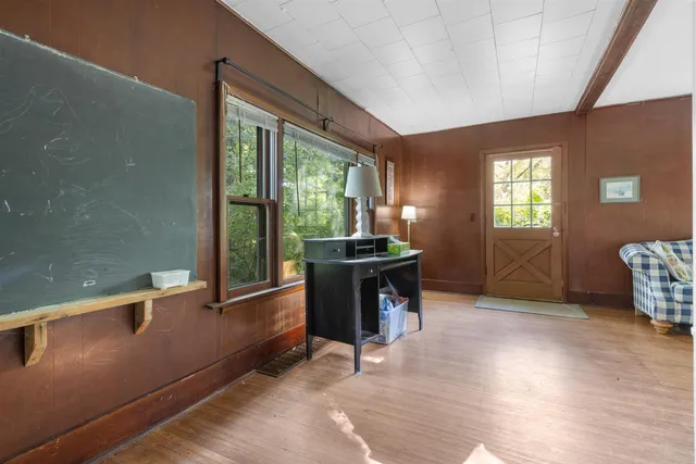 a room with furniture and window