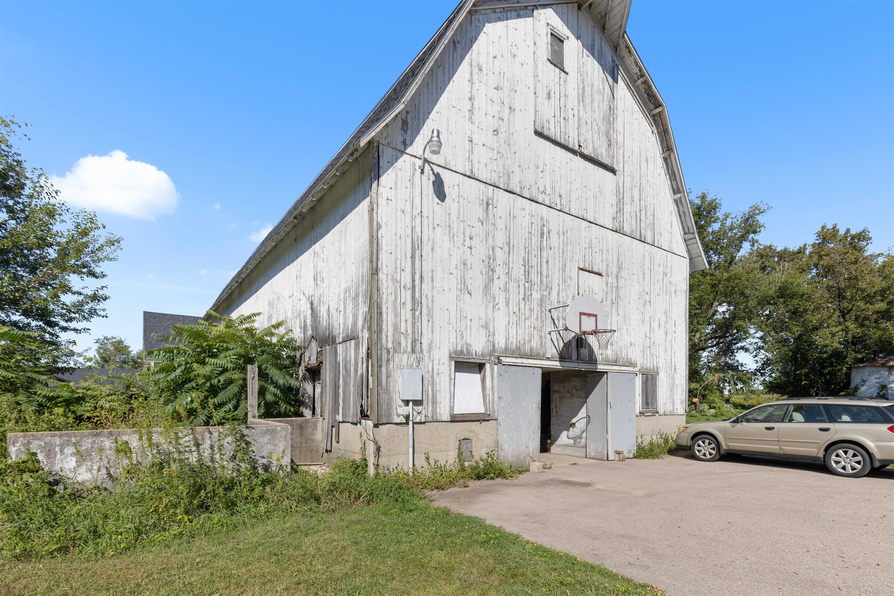 1610 South Turtle Town Hall Road Beloit, WI 53511 - Photo 5 of 50 a view of a car is parked in front of a house