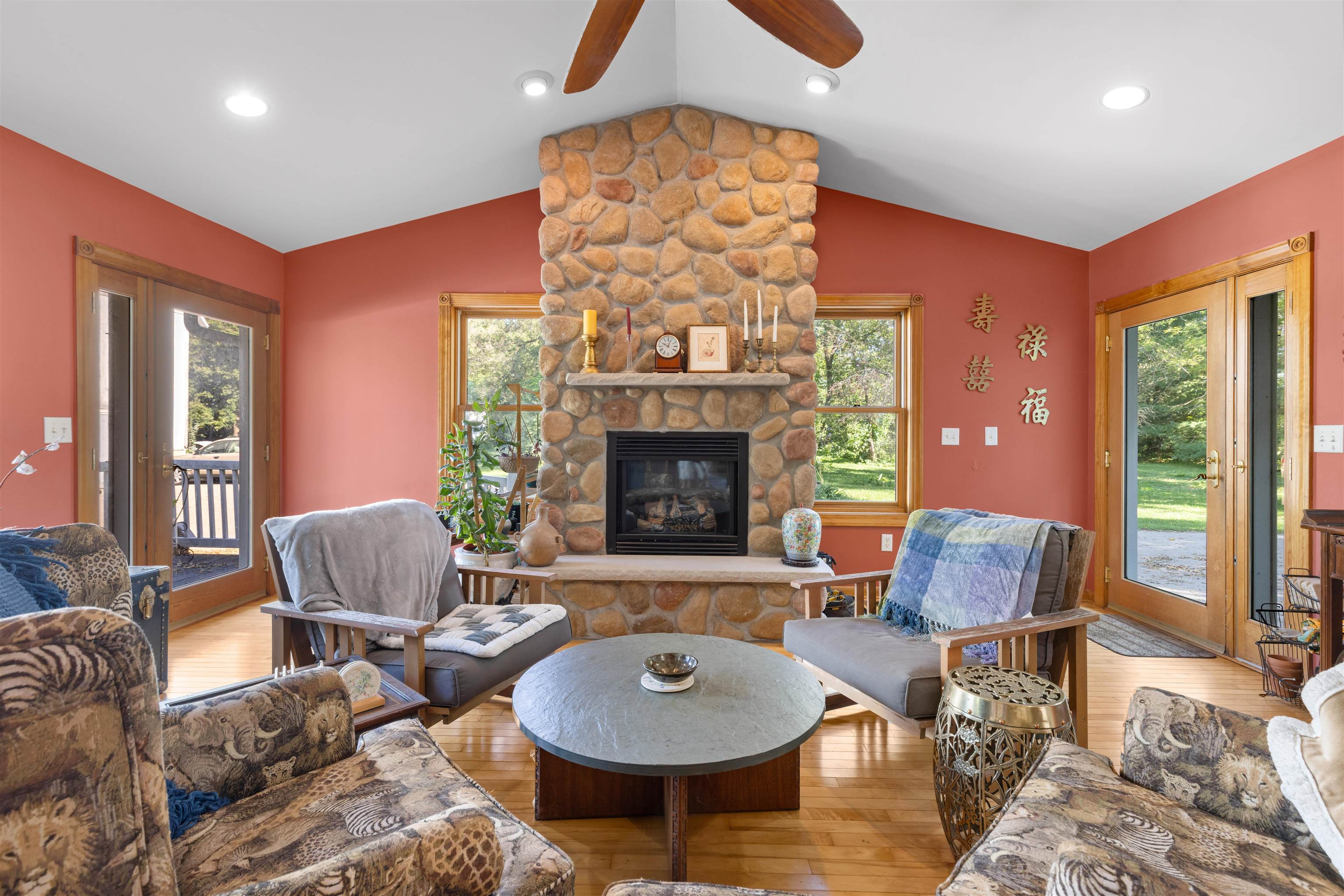 1610 South Turtle Town Hall Road Beloit, WI 53511 - Photo 8 of 50 a living room with furniture a window and a fireplace