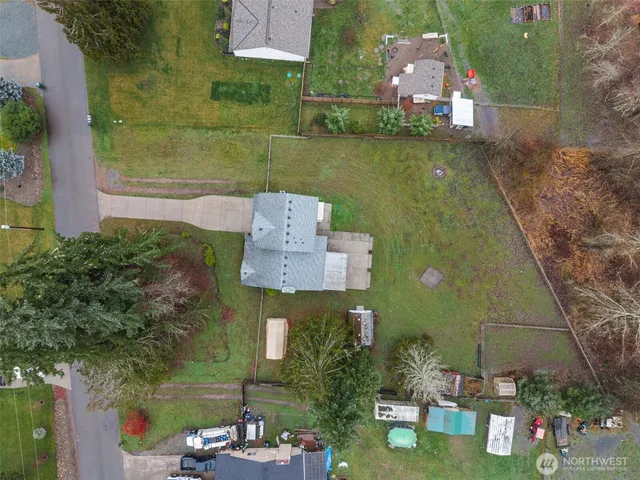 an aerial view of a house with a garden