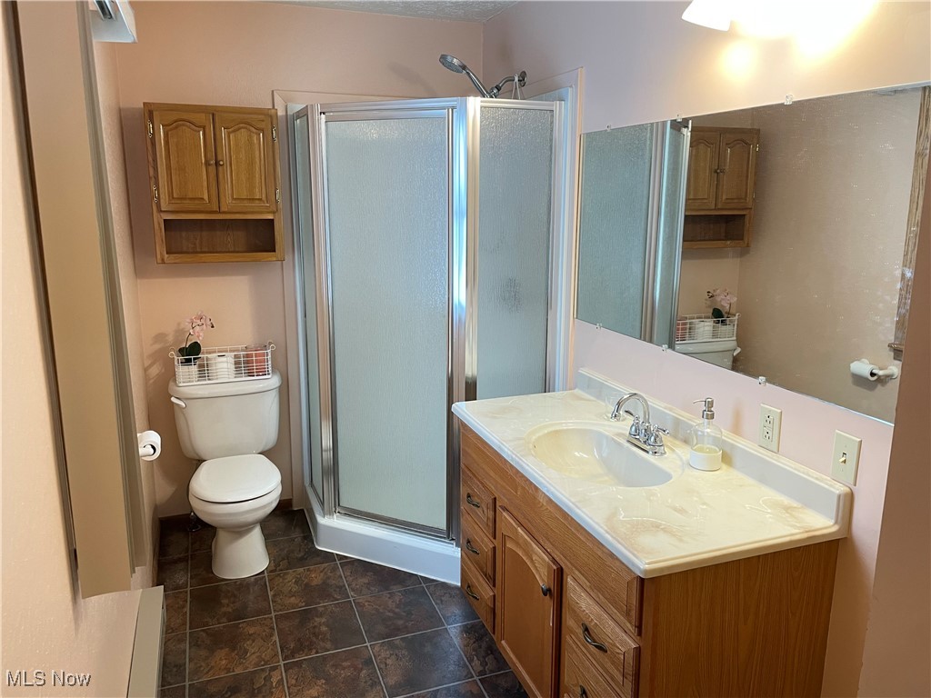 1381 Robb Road Conneaut, OH 44030 - Photo 21 of 50 Full bathroom with a stall shower and vanity