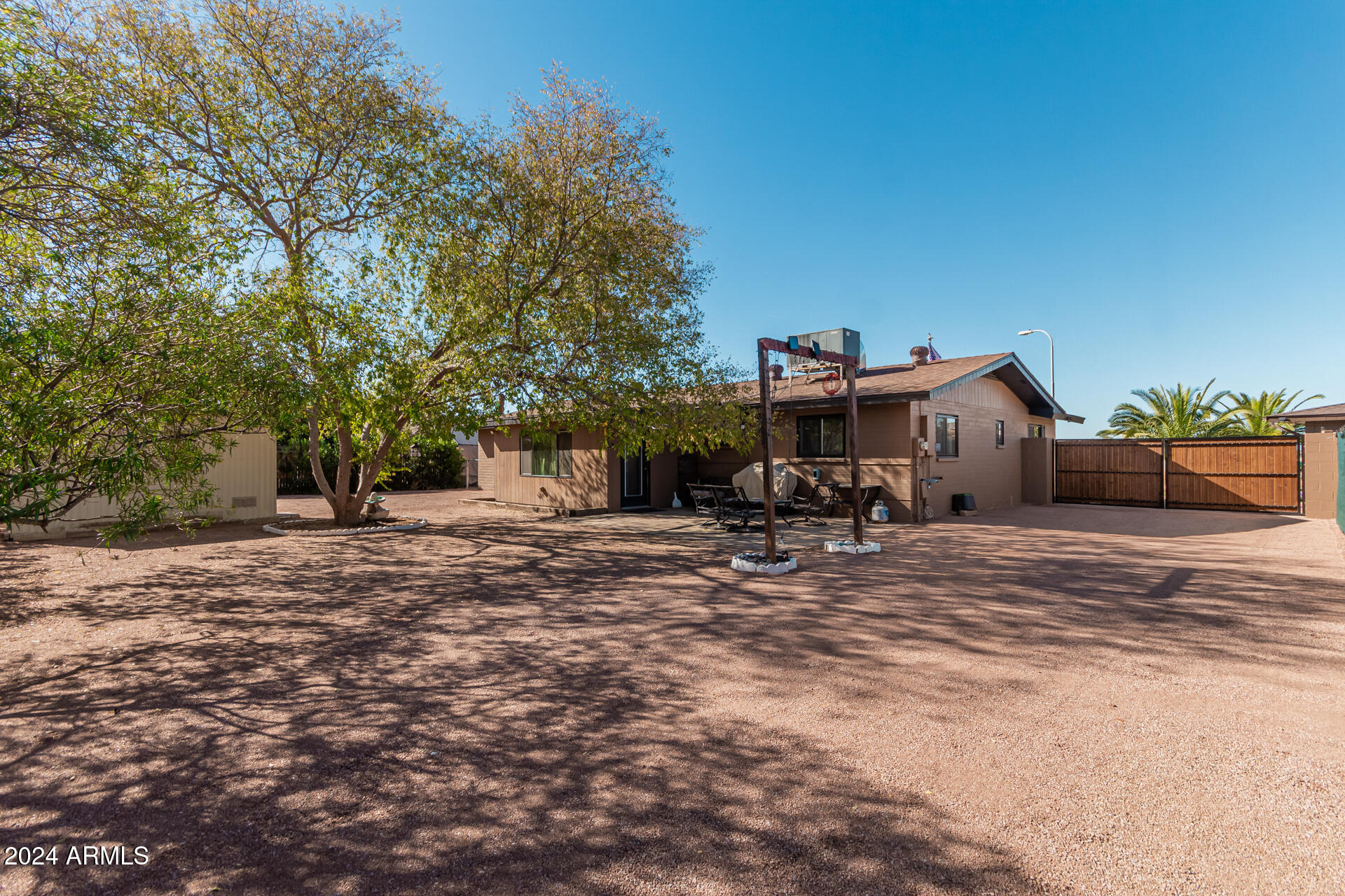 849 North 67th Place Mesa, AZ 85205 - Photo 31 of 47 a view of a house with backyard and sitting area