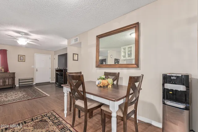 a view of a dining room with furniture