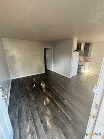 613 Stringer Street, Unit 4 Killeen, TX 76541 - Photo 3 of 7 a view of empty room with wooden floor