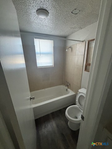 613 Stringer Street, Unit 4 Killeen, TX 76541 - Photo 5 of 7 a bathroom with a toilet a sink and bathtub