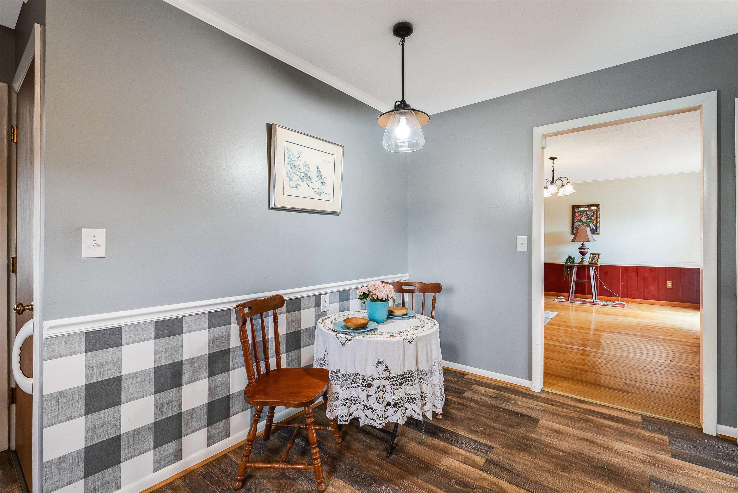 816 Todd Road Mount Sidney, VA 24467 - Photo 23 of 66 a view of a dining room with furniture wooden floor and a chandelier