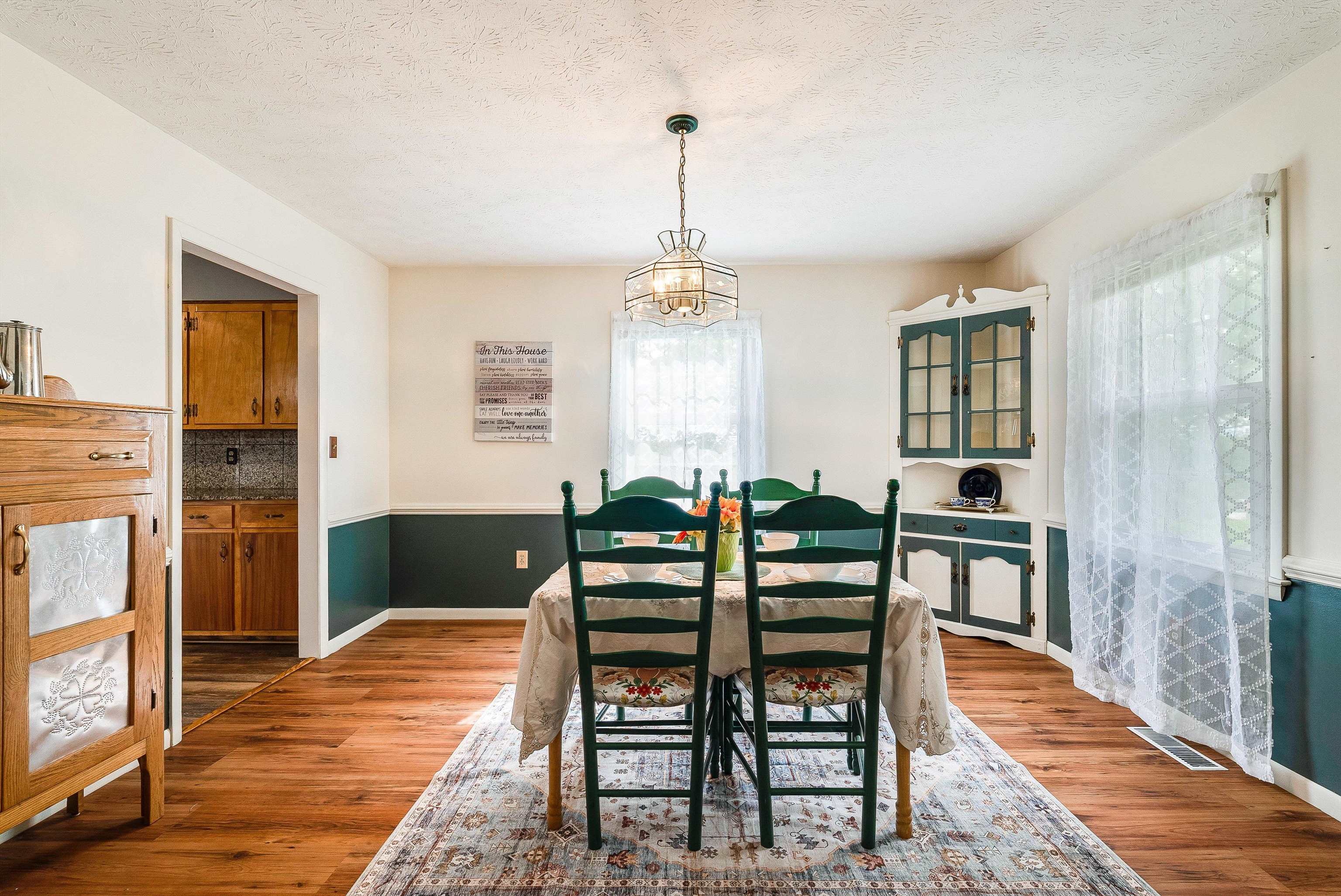 816 Todd Road Mount Sidney, VA 24467 - Photo 27 of 66 a view of a dining room with furniture window and wooden floor