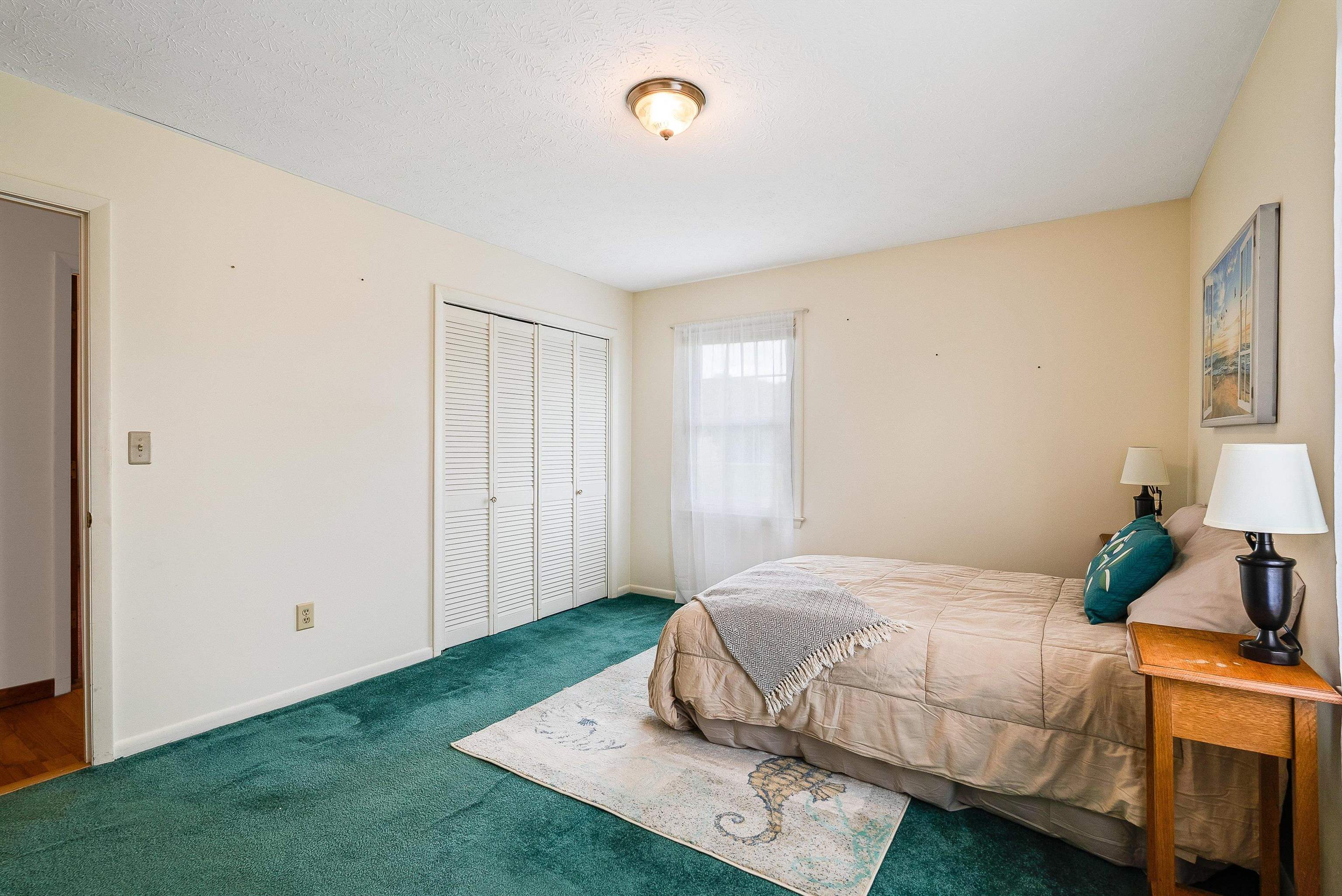816 Todd Road Mount Sidney, VA 24467 - Photo 31 of 66 a bedroom with a bed and a window