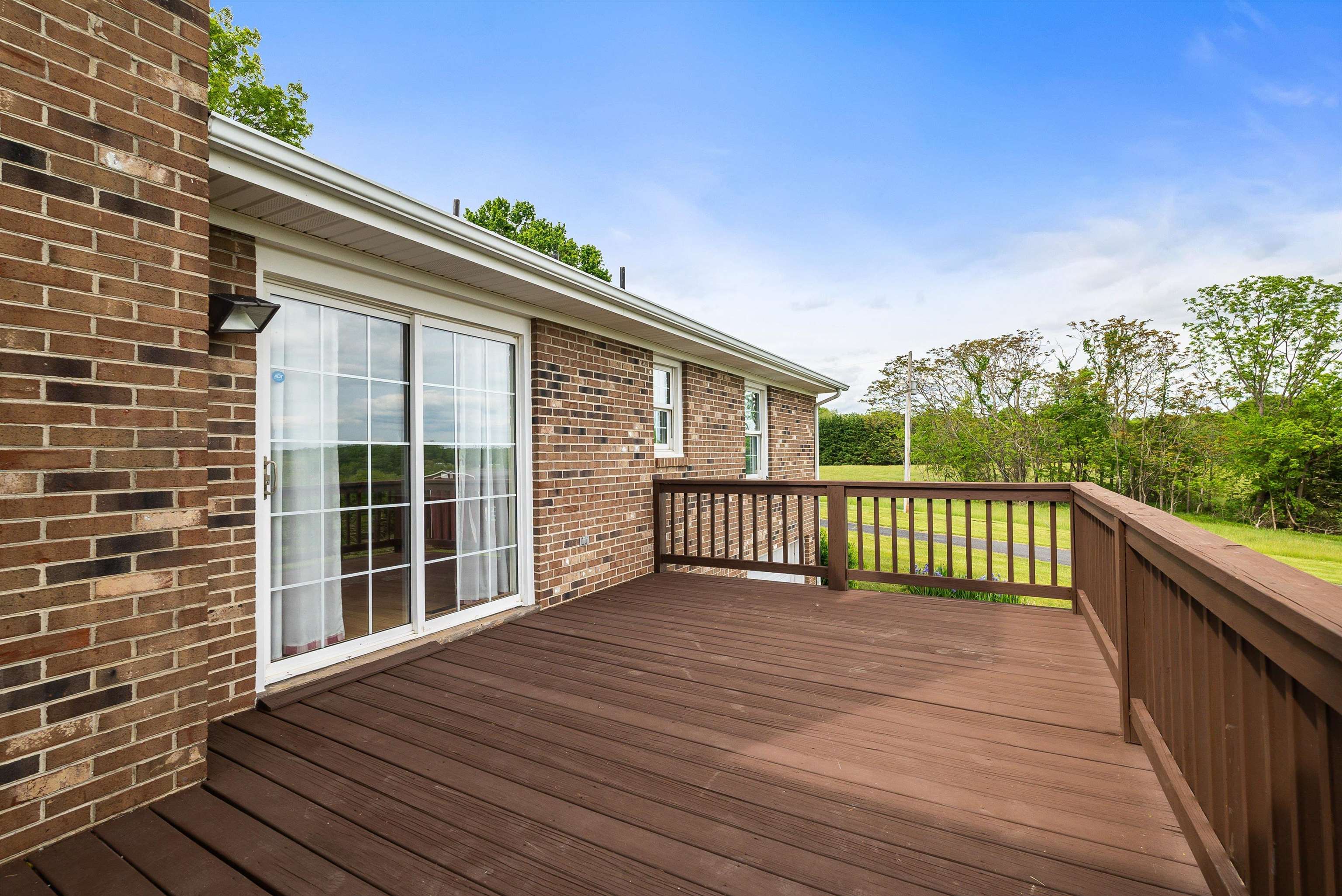 816 Todd Road Mount Sidney, VA 24467 - Photo 43 of 66 a view of a balcony with wooden floor