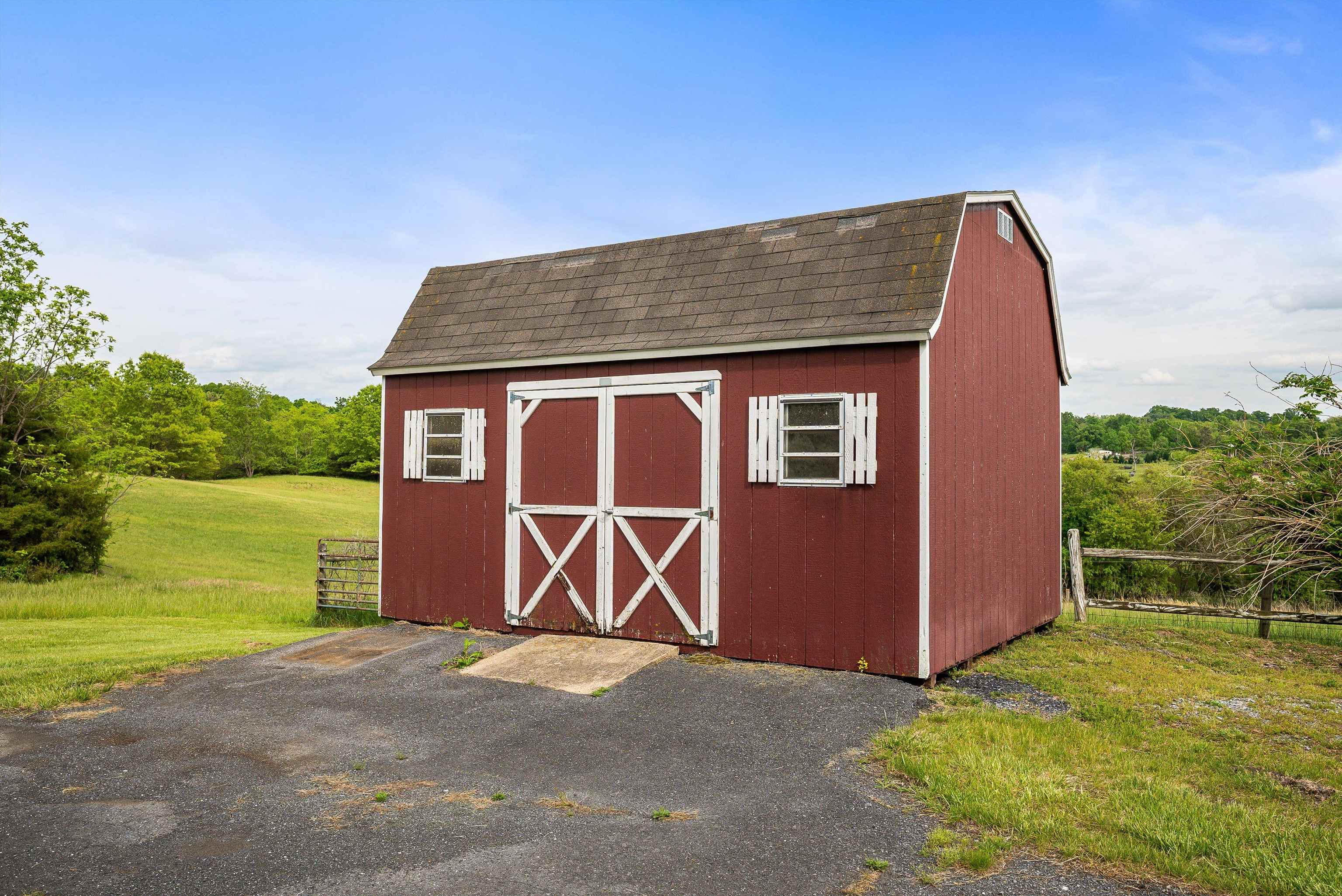816 Todd Road Mount Sidney, VA 24467 - Photo 45 of 66 a front view of a house with garden