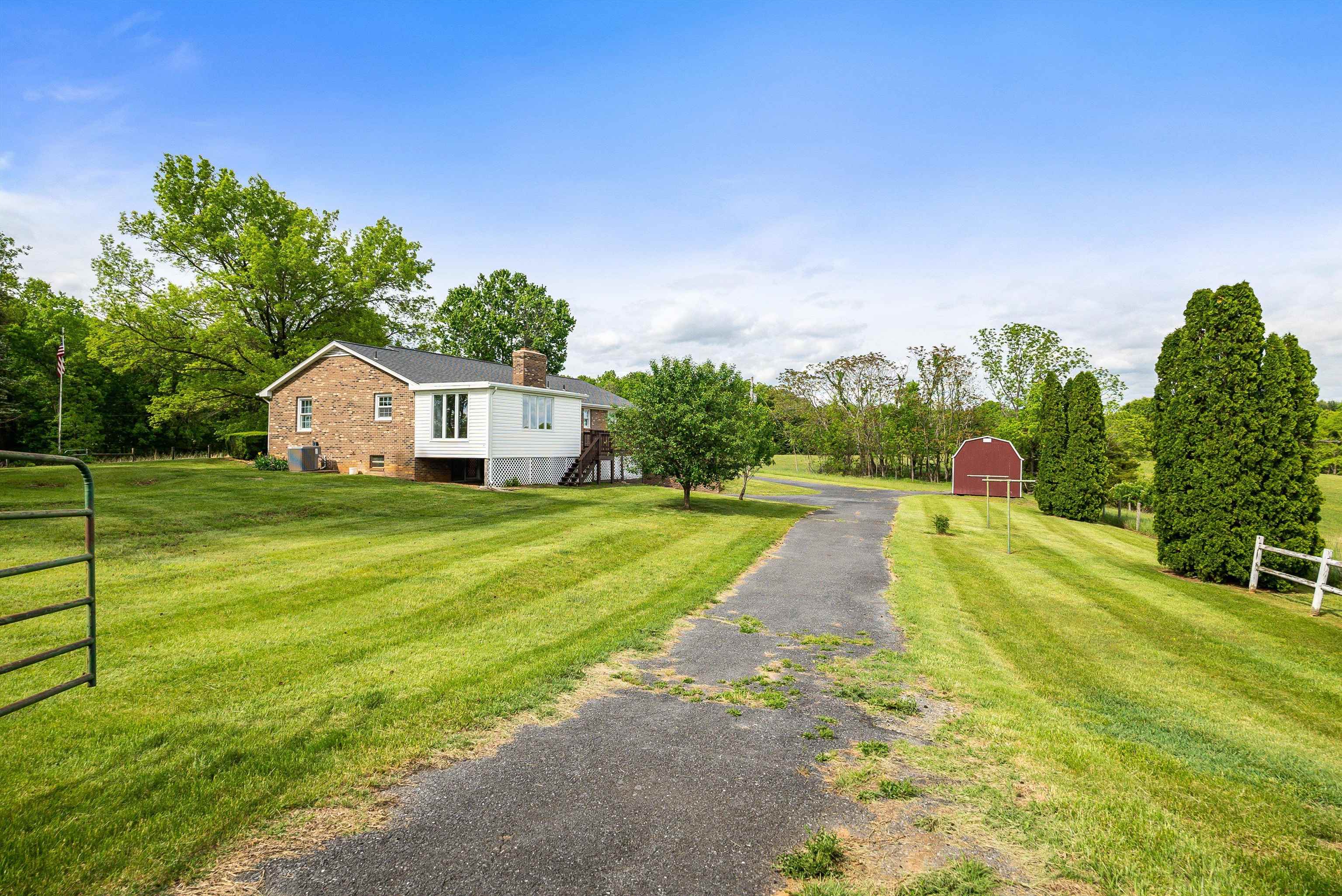 816 Todd Road Mount Sidney, VA 24467 - Photo 51 of 66 a house view with swimming pool in front of it