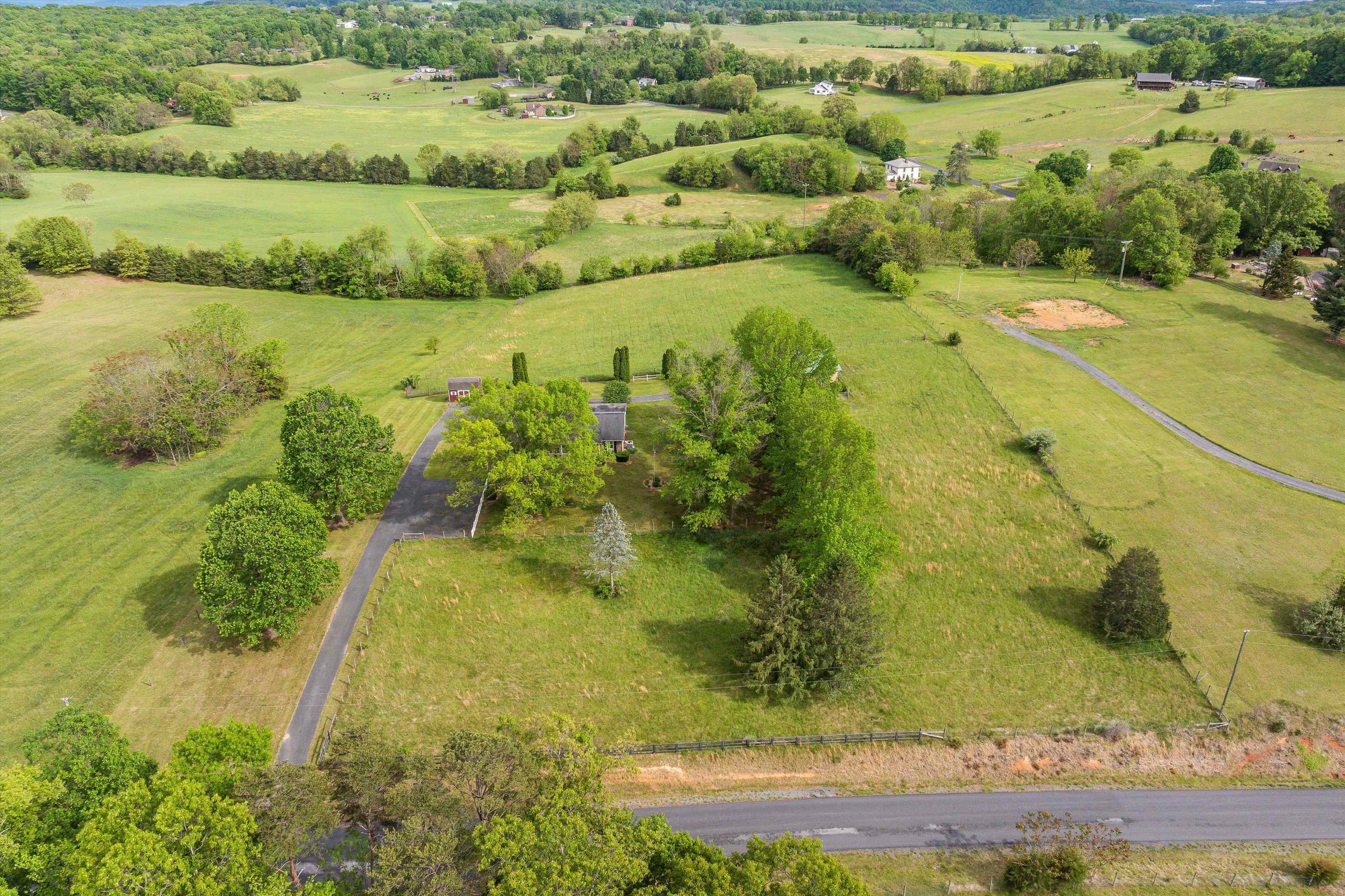 816 Todd Road Mount Sidney, VA 24467 - Photo 56 of 66 a view of a lake with a yard