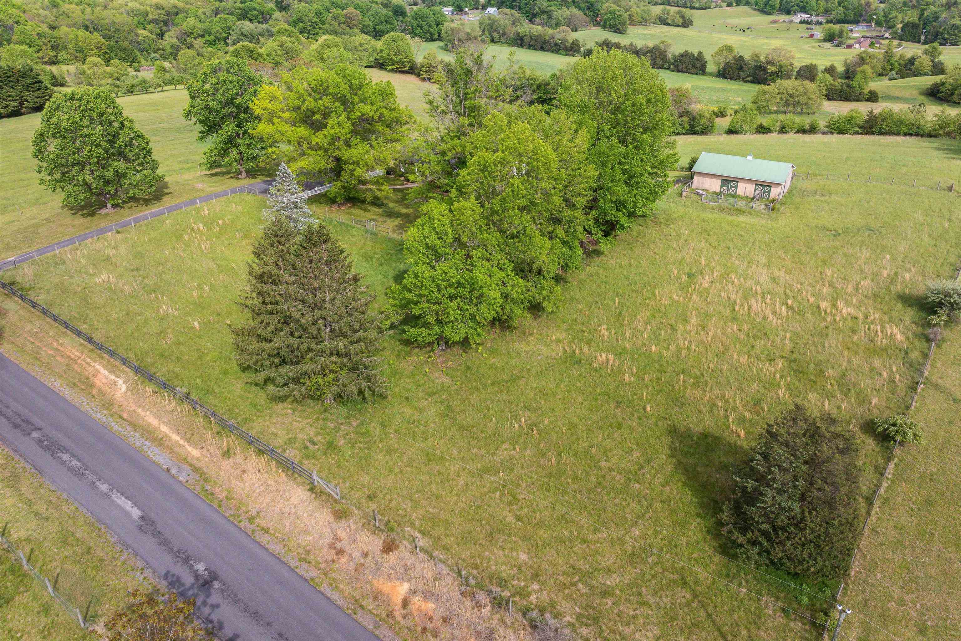 816 Todd Road Mount Sidney, VA 24467 - Photo 59 of 66 a view of a lake with houses