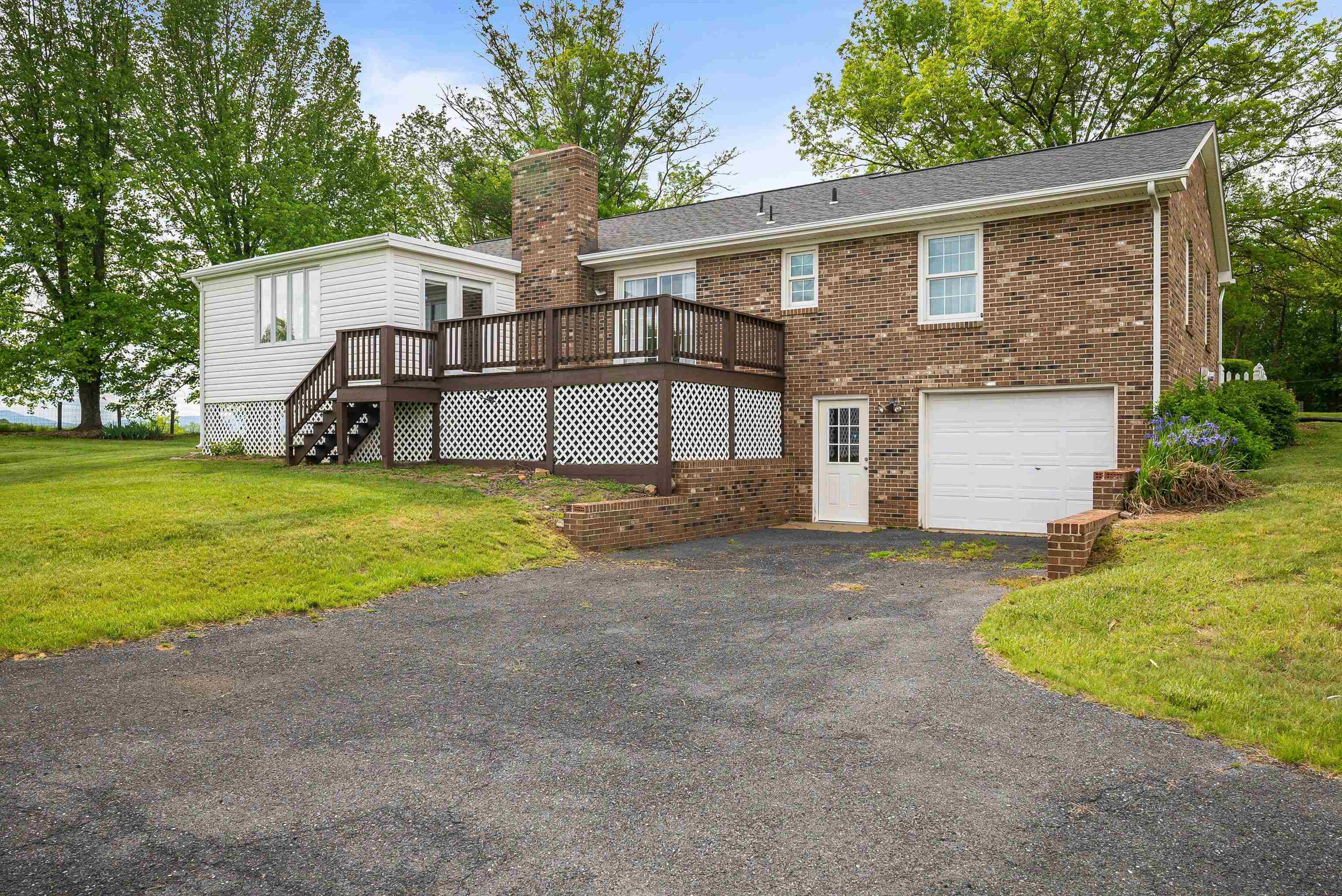 816 Todd Road Mount Sidney, VA 24467 - Photo 7 of 66 a front view of house with yard and garage