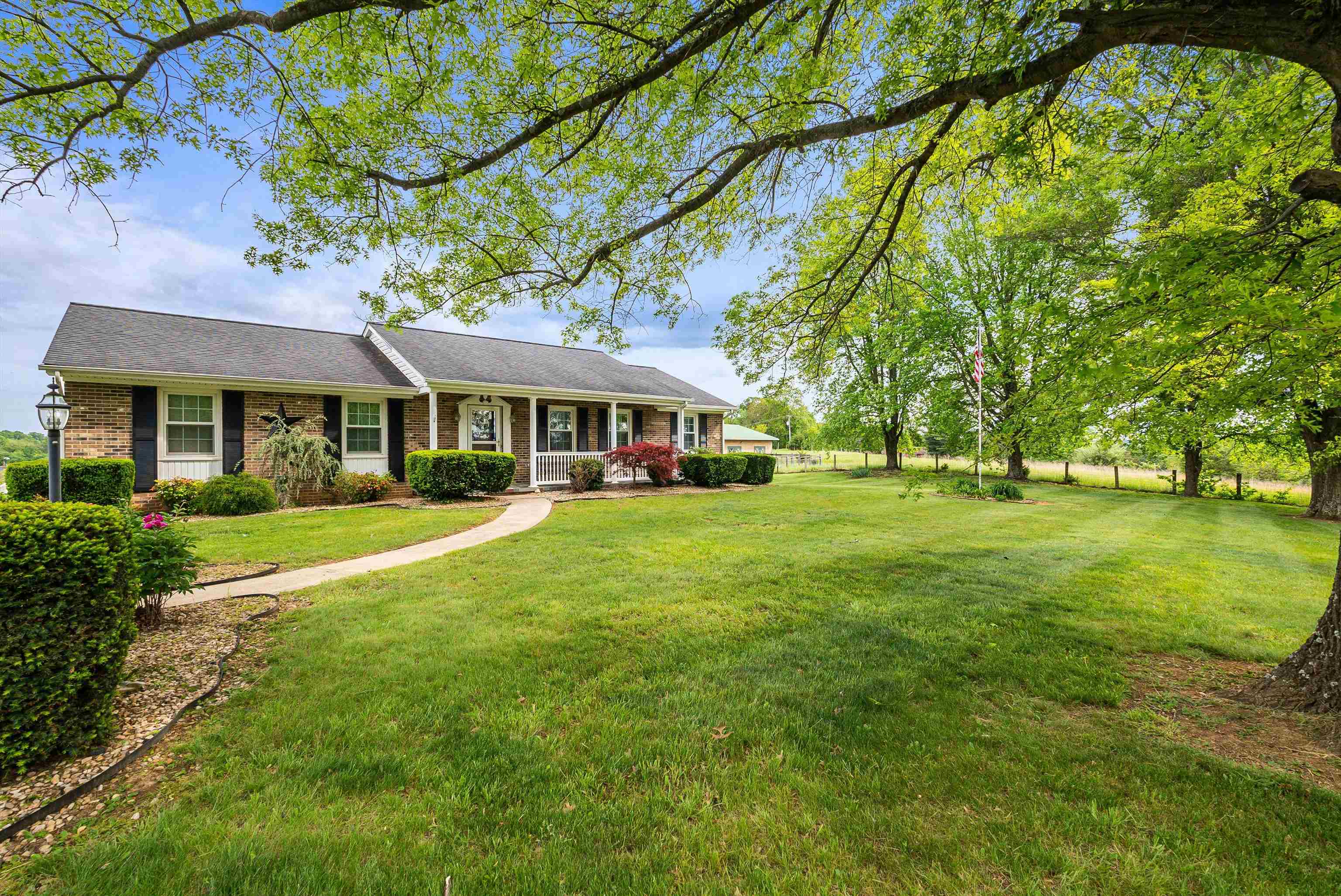 816 Todd Road Mount Sidney, VA 24467 - Photo 10 of 66 a front view of a house with a yard