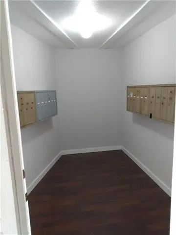 a view of a car parked on the side of the road