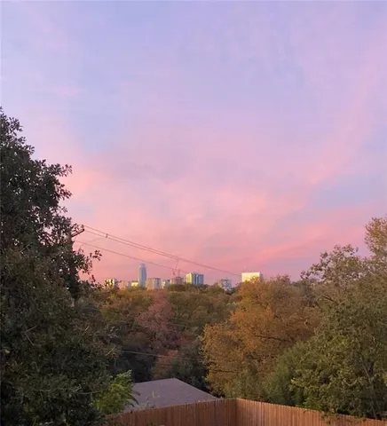 a view of a city from a mirror