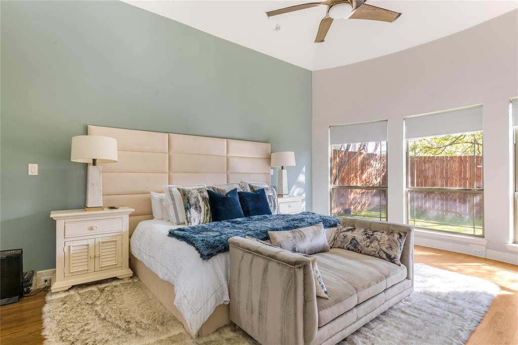 3914 Dunhaven Road Dallas, TX 75220 - Photo 13 of 21 a bedroom with a bed and window
