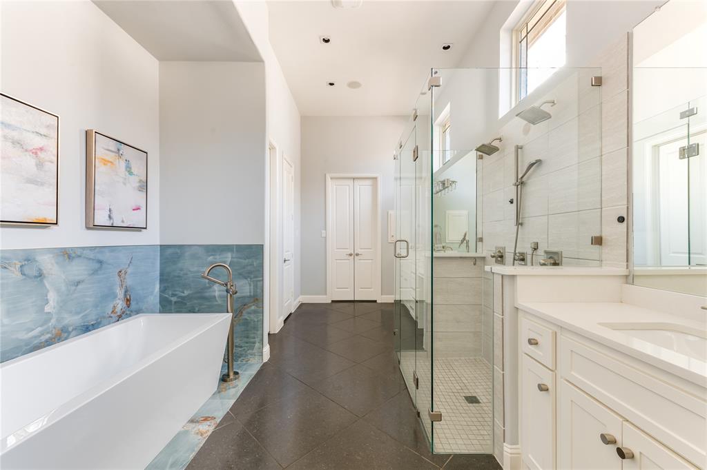 3914 Dunhaven Road Dallas, TX 75220 - Photo 14 of 21 a bathroom with a bathtub and a sink