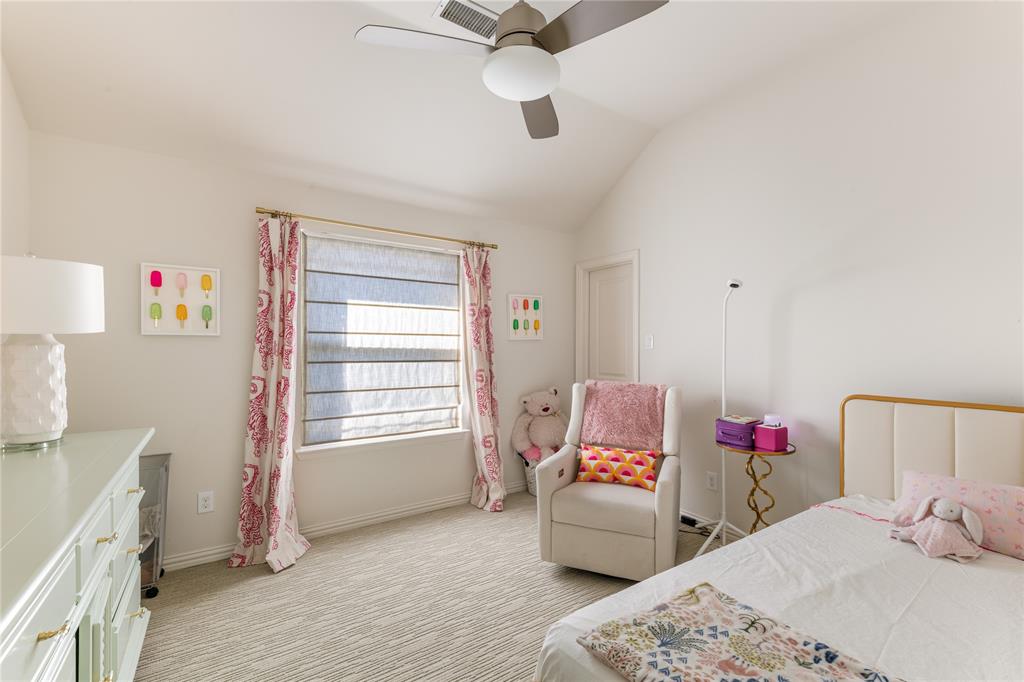 3914 Dunhaven Road Dallas, TX 75220 - Photo 18 of 21 a bedroom with a bed dresser and a window
