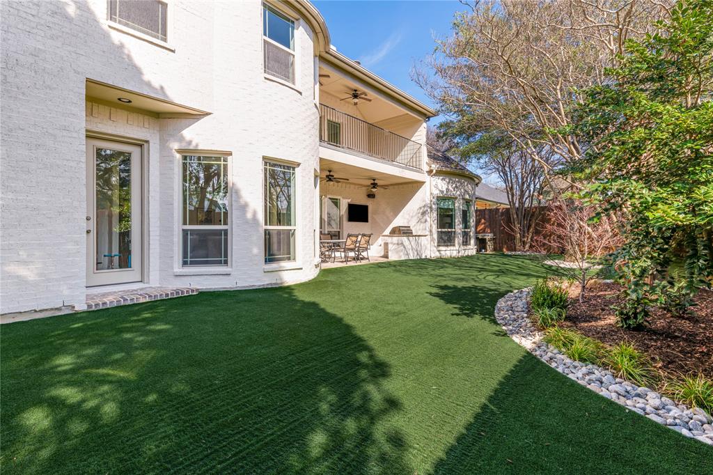 3914 Dunhaven Road Dallas, TX 75220 - Photo 5 of 21 a view of a house with a yard