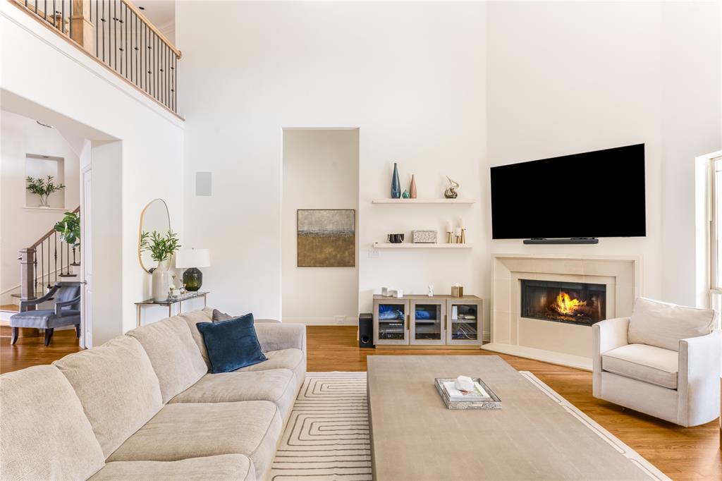 3914 Dunhaven Road Dallas, TX 75220 - Photo 7 of 21 a living room with furniture and a flat screen tv