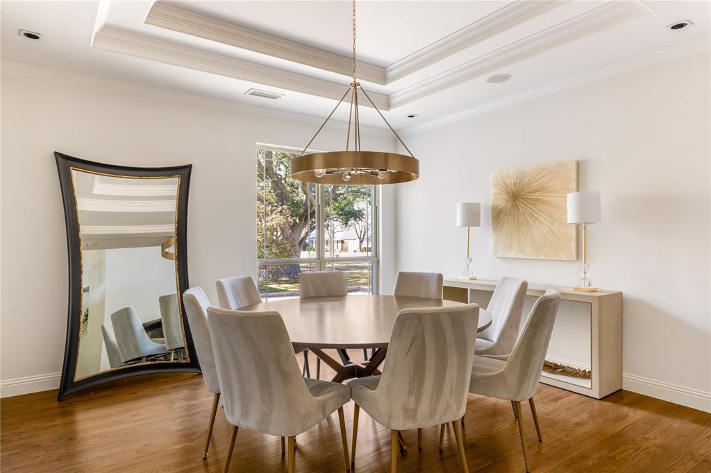 3914 Dunhaven Road Dallas, TX 75220 - Photo 8 of 21 a dining room with furniture window and wooden floor