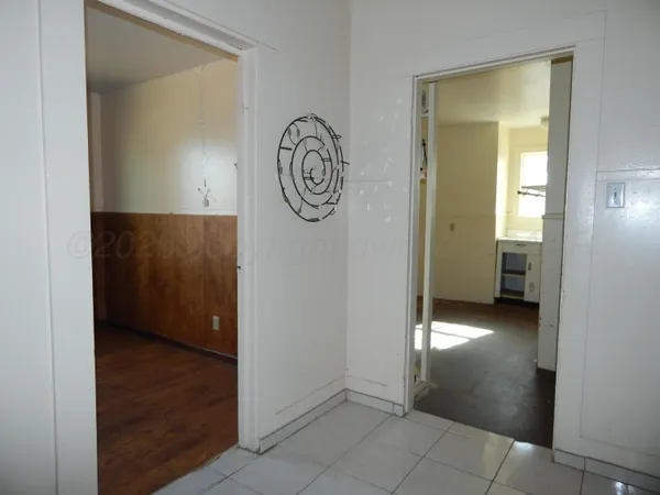 a view of a hallway with elevator