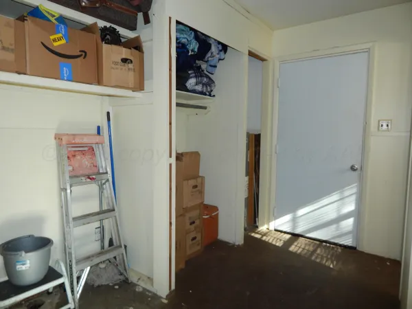 a view of room with window and storage