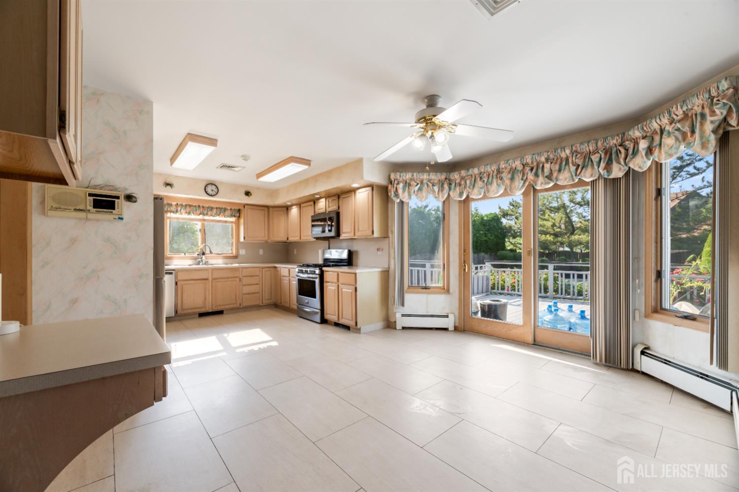 6 Allison Court Edison, NJ 08820 - Photo 12 of 53 a open kitchen with cabinets and stainless steel appliances