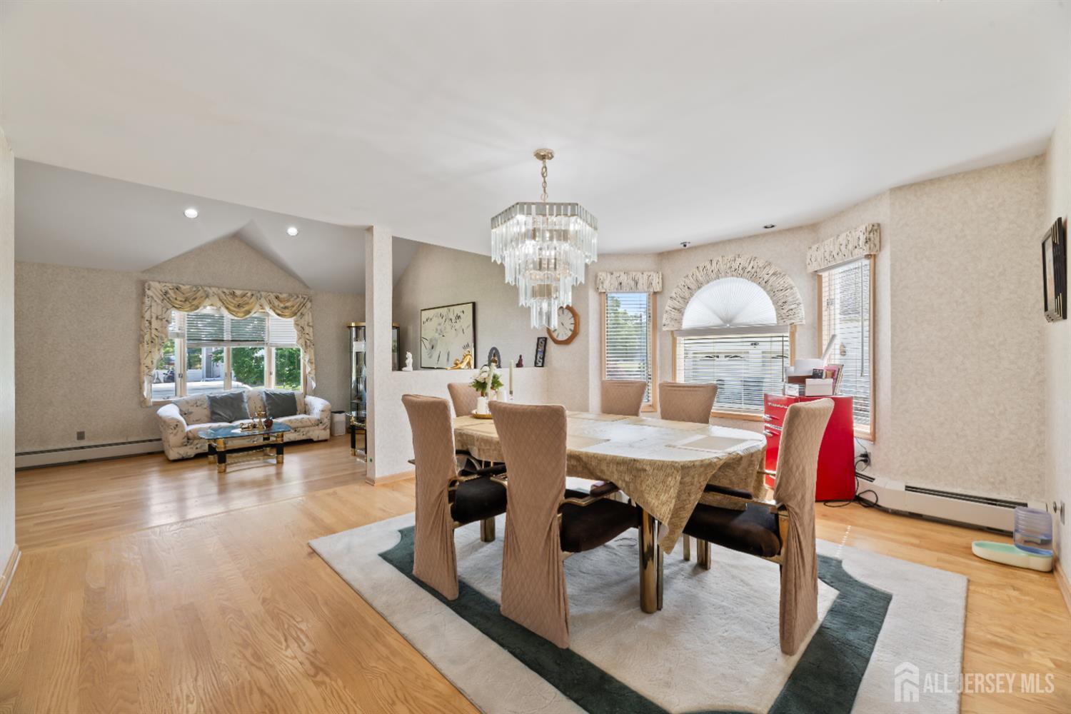 6 Allison Court Edison, NJ 08820 - Photo 14 of 53 a view of a dining room with furniture window and wooden floor