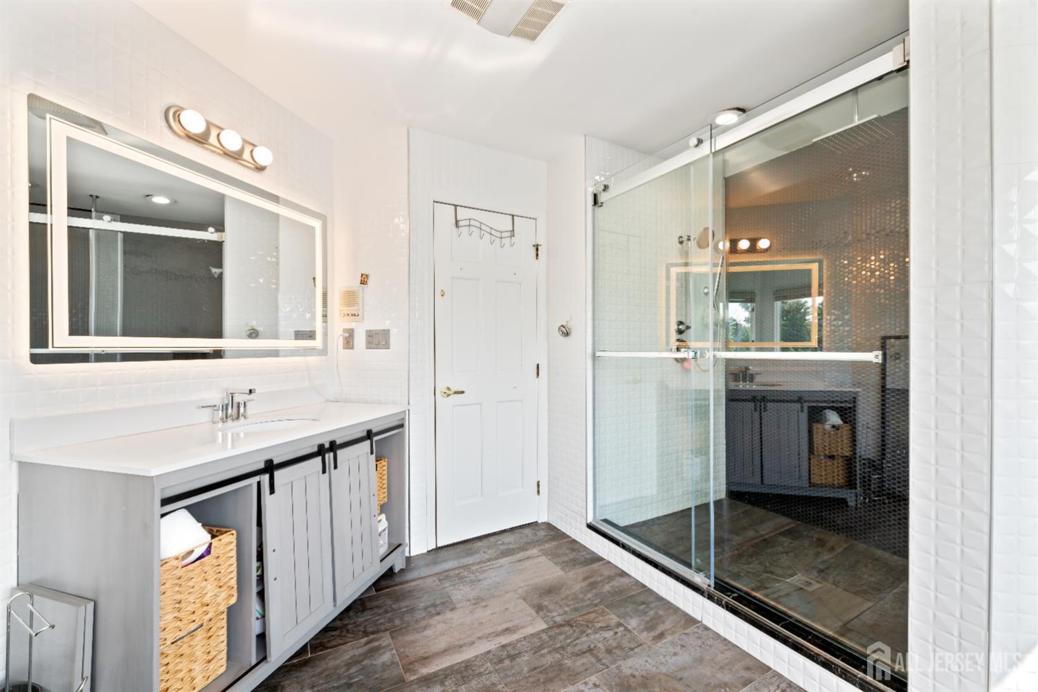 6 Allison Court Edison, NJ 08820 - Photo 21 of 53 a bathroom with a sink and a mirror
