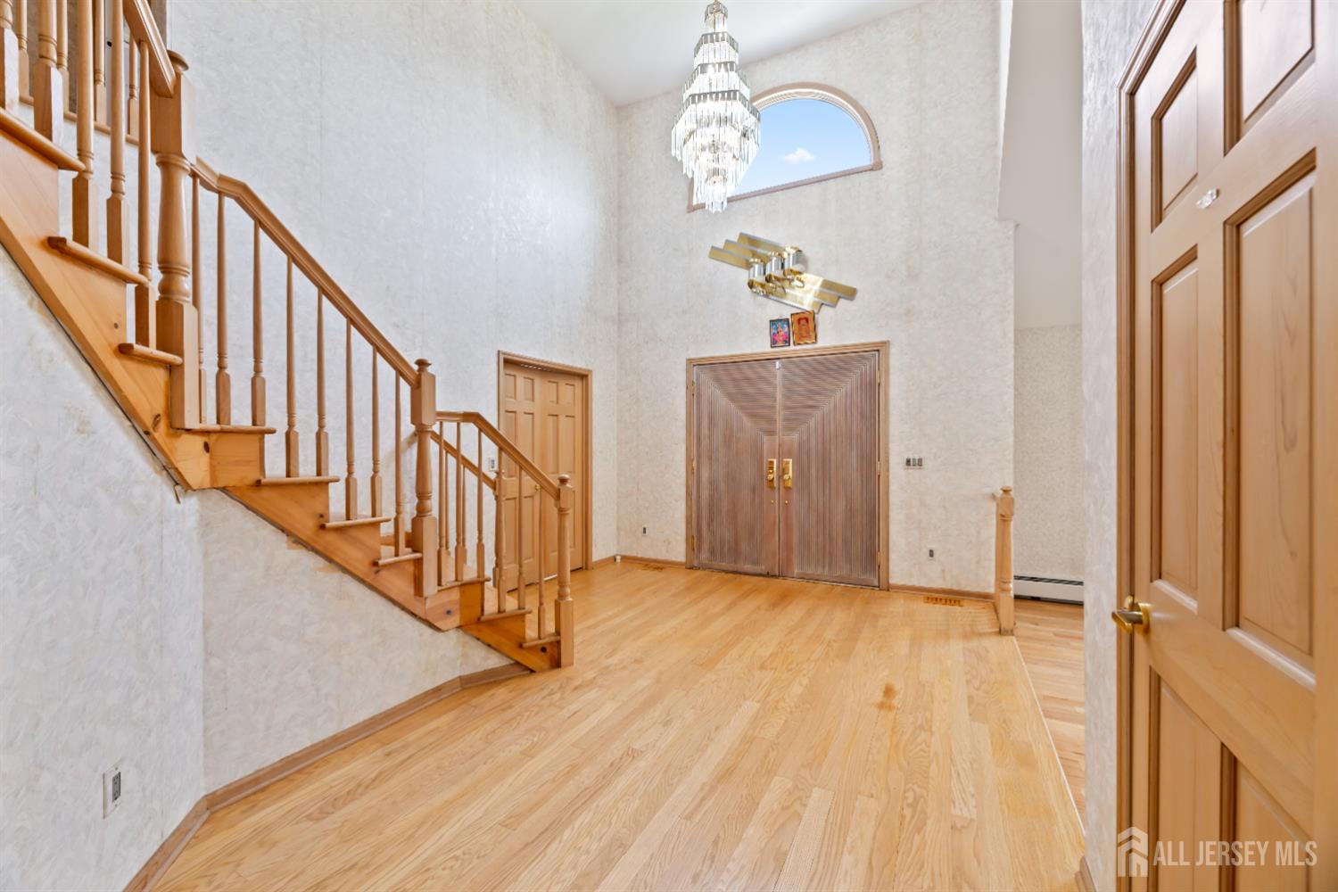 6 Allison Court Edison, NJ 08820 - Photo 5 of 53 a view of an entryway with wooden floor